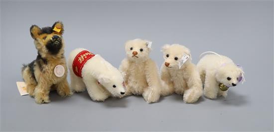 Two replica Steiff rattle bears, a Steiff German Shepherd, a Polar bear ornament and a Steiff limited edition Polar bear ornament